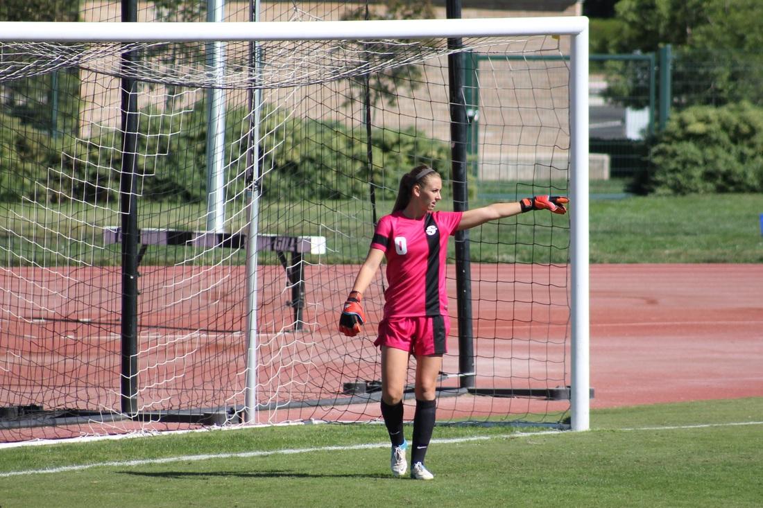 Chelsea Lewandowski directing her fellow warriors on the pitch