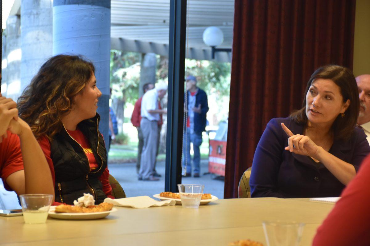 Vice President of Student Affairs, Dr. Suzanne Espinoza talking with Fatima Serrato in PACE student meeting on Wednesday, Oct 28.