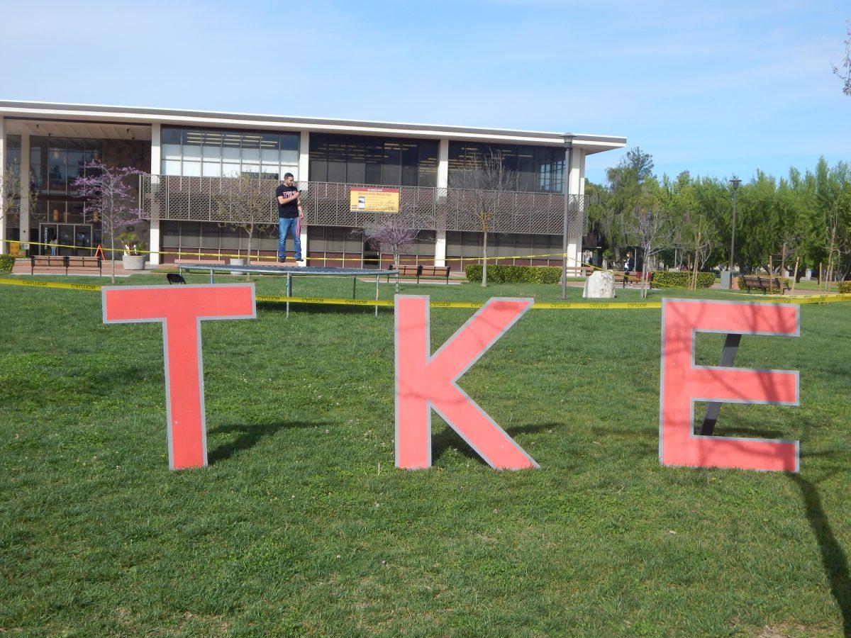 Greek letters representing Tau Kappa Epsilon, the hosts of the "Jump for Jude" event