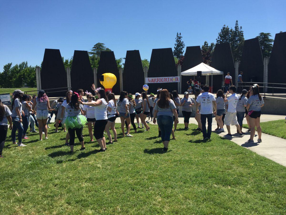 Phi Mu dance marathon participants start to warm up to some throwback tunes shortly after kick off.&#160;Turlock, California, Saturday, April 16, 2016.&#160;