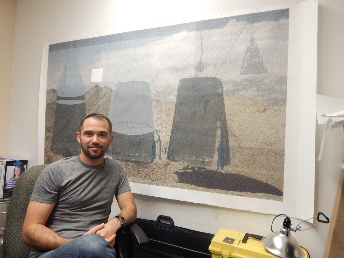 Professor Marty Azevedo sits in from to of his example non-traditional landscapes. (The Signal/Gracie Carrillo)