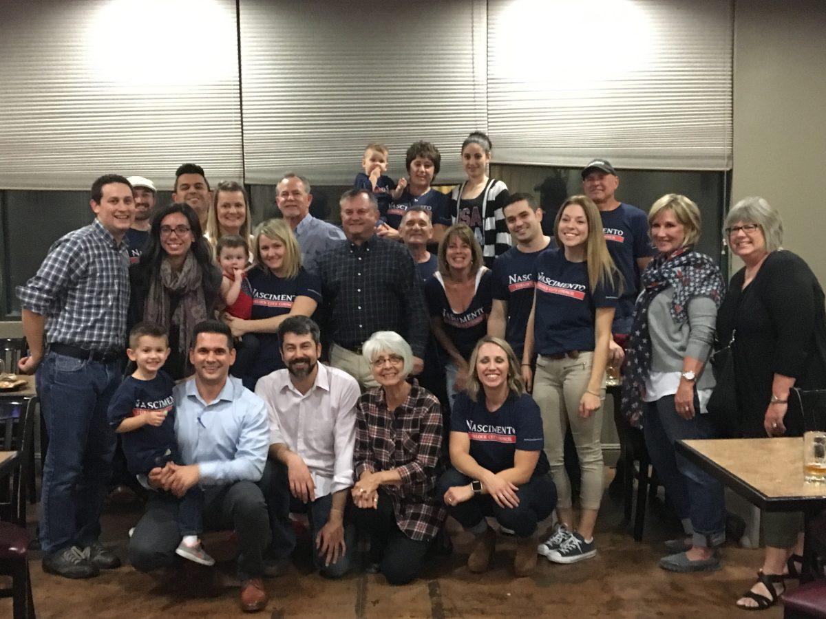 Nascimento ends election night with a group picture with his supportive friends and family