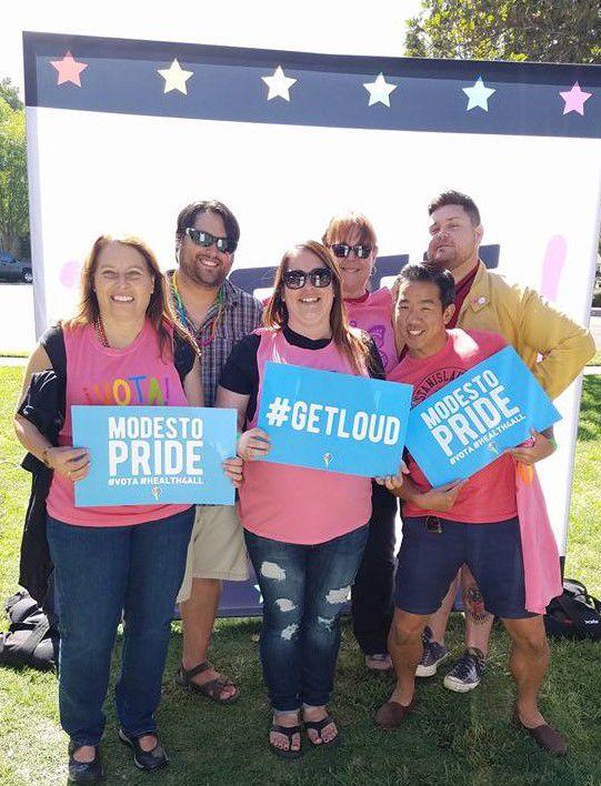 Mentors participating in a photo op. for the California Endowment at Modesto Pride on Oct. 1, 2016. (Signal Photo/Steph Landeros)Back row: Dr. Matt Morberly, Dr.&#160;Valerie Leyva, and Dr. Paul Morgan.Front Row: Dr. Vicky Harvey, Professor Rachel Grimshaw, and Dr. Dana Nakano.