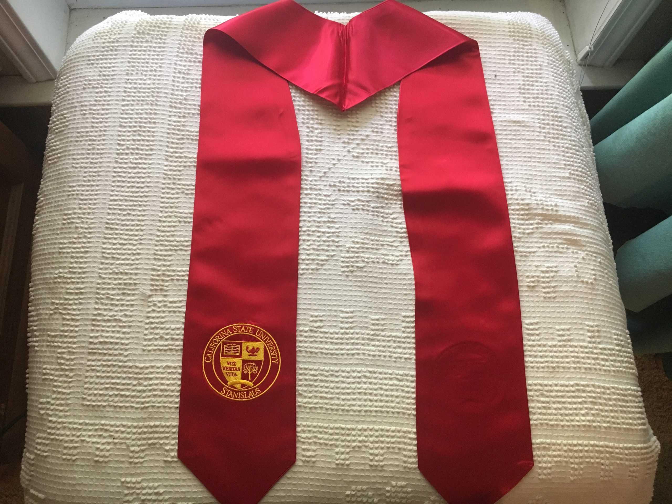 Bookstore sells misspelled graduation stoles