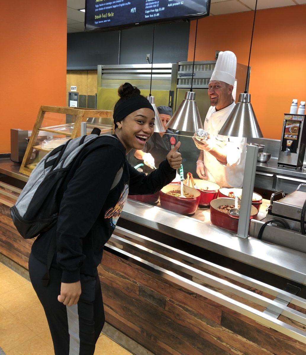 Executive Chef, Caleb Sisco, providing excellent service to student Eyriana Eatman (freshman, Pre-Nursing) Photo courtesy of Joseph Castillo