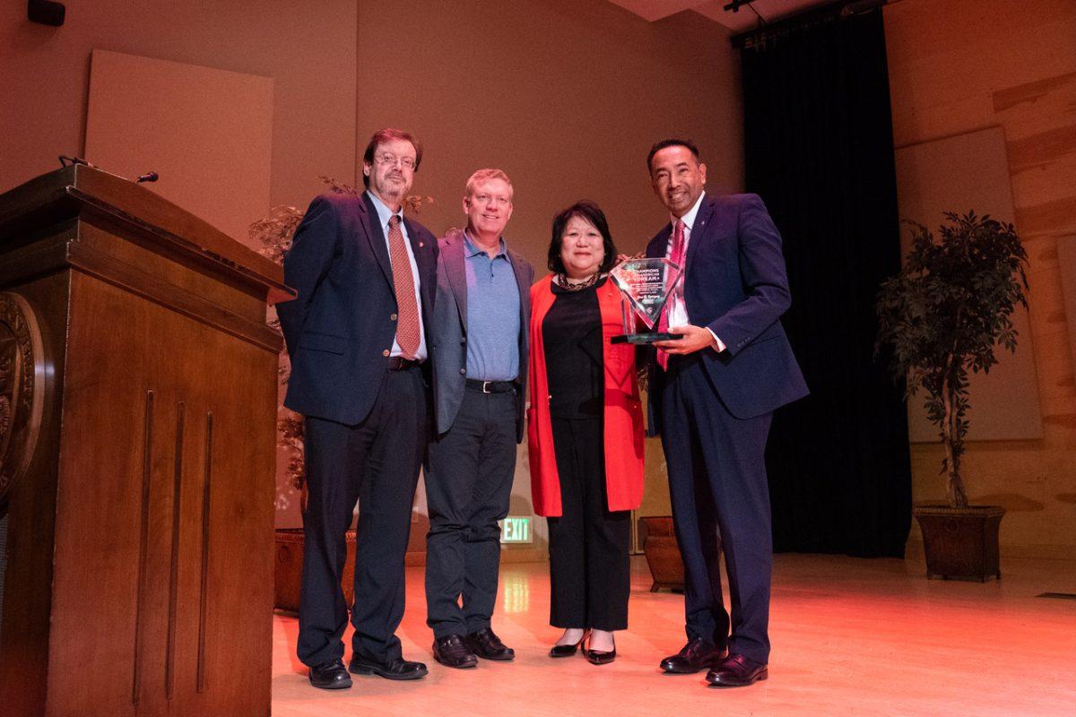 A photo of Jose Rodriguez recieving the Champion of the American Dream award along with Tomas Gomez Arias, PhD, Evan Porges and President Junn.(Photo&#160;contributed by Stanislaus State Communications and Public Affairs.)