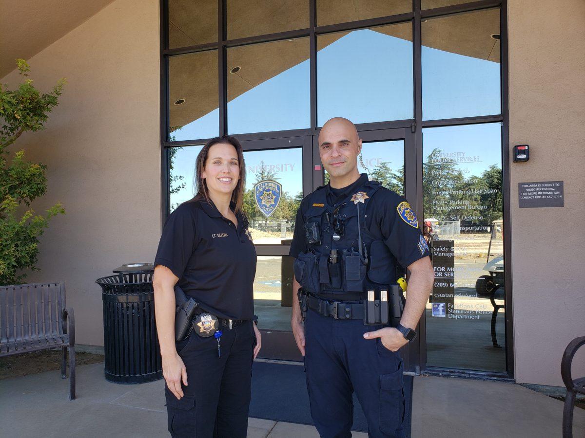 Lt. Cheri Silveira (left) and Officer Givo Ysael (right) stand in front of the University Police Department. (Photo courtesy of Essense Saunders)&#160;