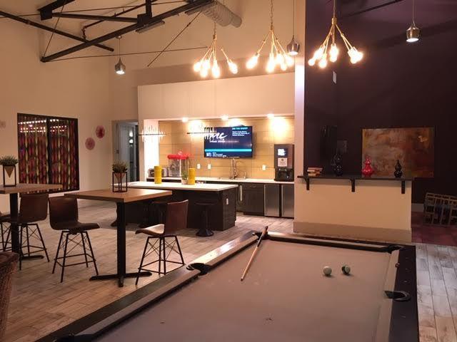 The community lounge, where residents gather to relax, enjoy a beverage orplay billiards. (Photo courtesy of Grant Victor)