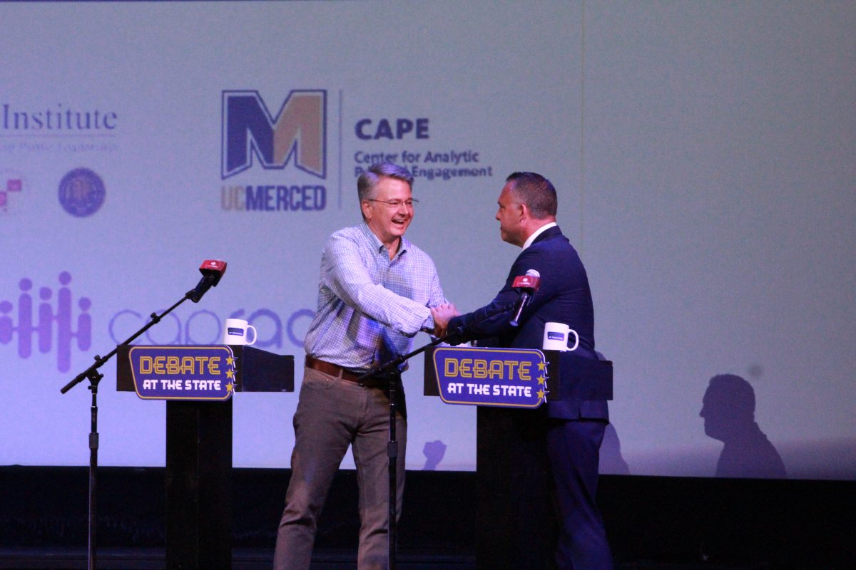 John Duarte (left) and Adam Gray (right) shake hands after the Debate. 