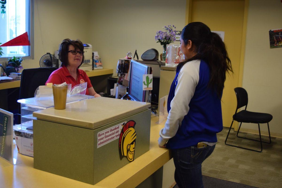 A financial administrator assists a student with her financial questions. (Photo Courtesy of Gabriella Germann)