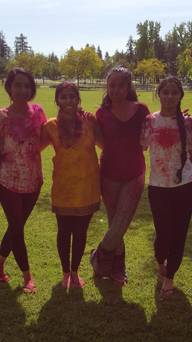 <p>Friends covered in Holi color while running around and celebrating Holi in itself. (Photo Courtesy of Sandeep Kaur)</p>