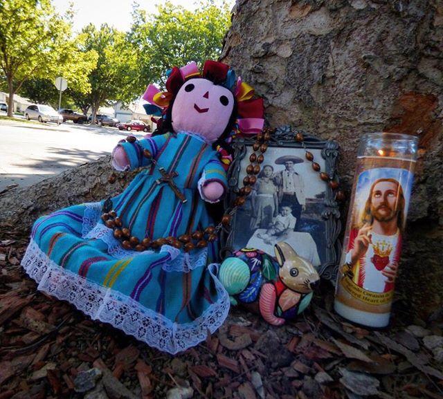 Offerings for Day of the Dead consist of the deceased's favorite objects, and at times foods, along with a picture of them and a religious candle. (Signal Photo/Andrew Cabrera)