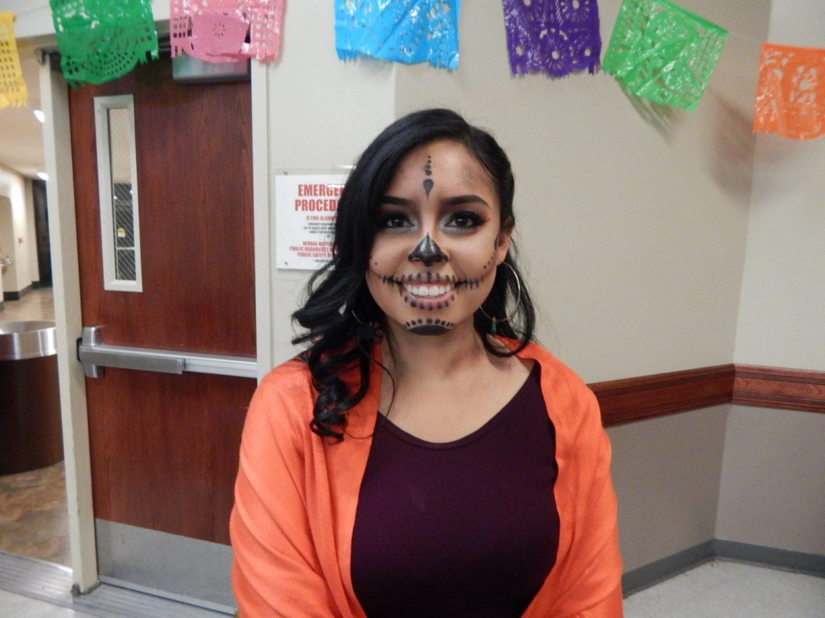 Janneth Rodriguez with Catrina,&#160;or skull makeup. (Signal Photo/Jesus Valdez)