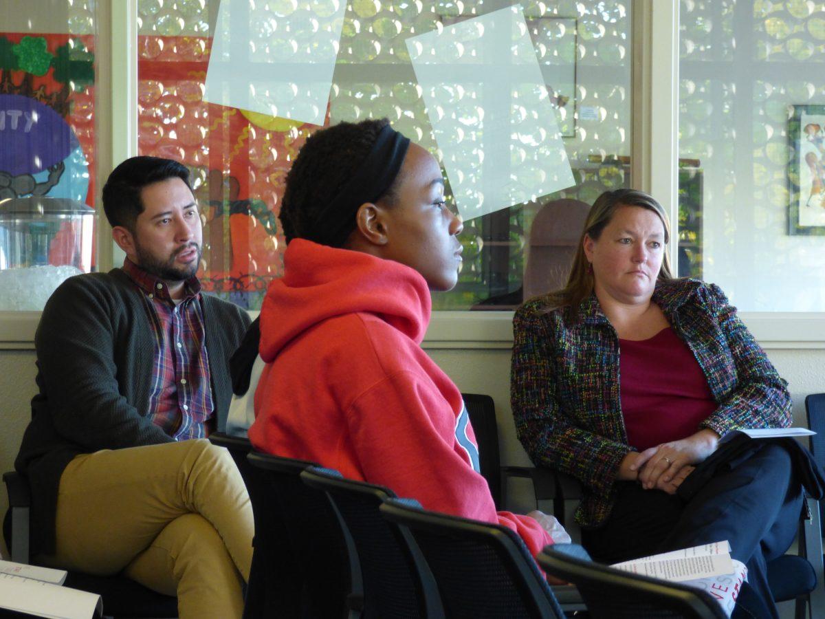 Students and staff listening to the poetry readings. (Signal Photo/ Andrew Cabrera)