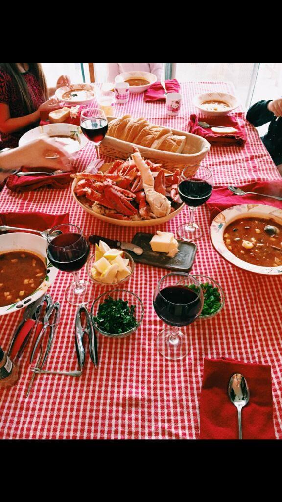 Tristan Rodenborn's family enjoying their cioppino dinner. (Photograph contributed by Tristan Rodenborn).&#160;