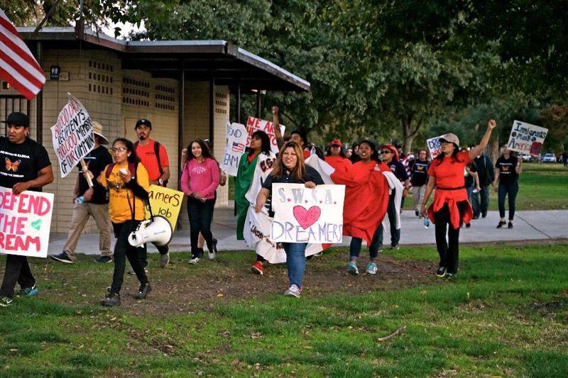 Members of MEChA and other supporters arriving at Cesar E. Chavez Park in Modesto, CA, during their November 2017 march for a &#8220;clean&#8221; DREAM Act. (Photo Courtesy of MEChA)