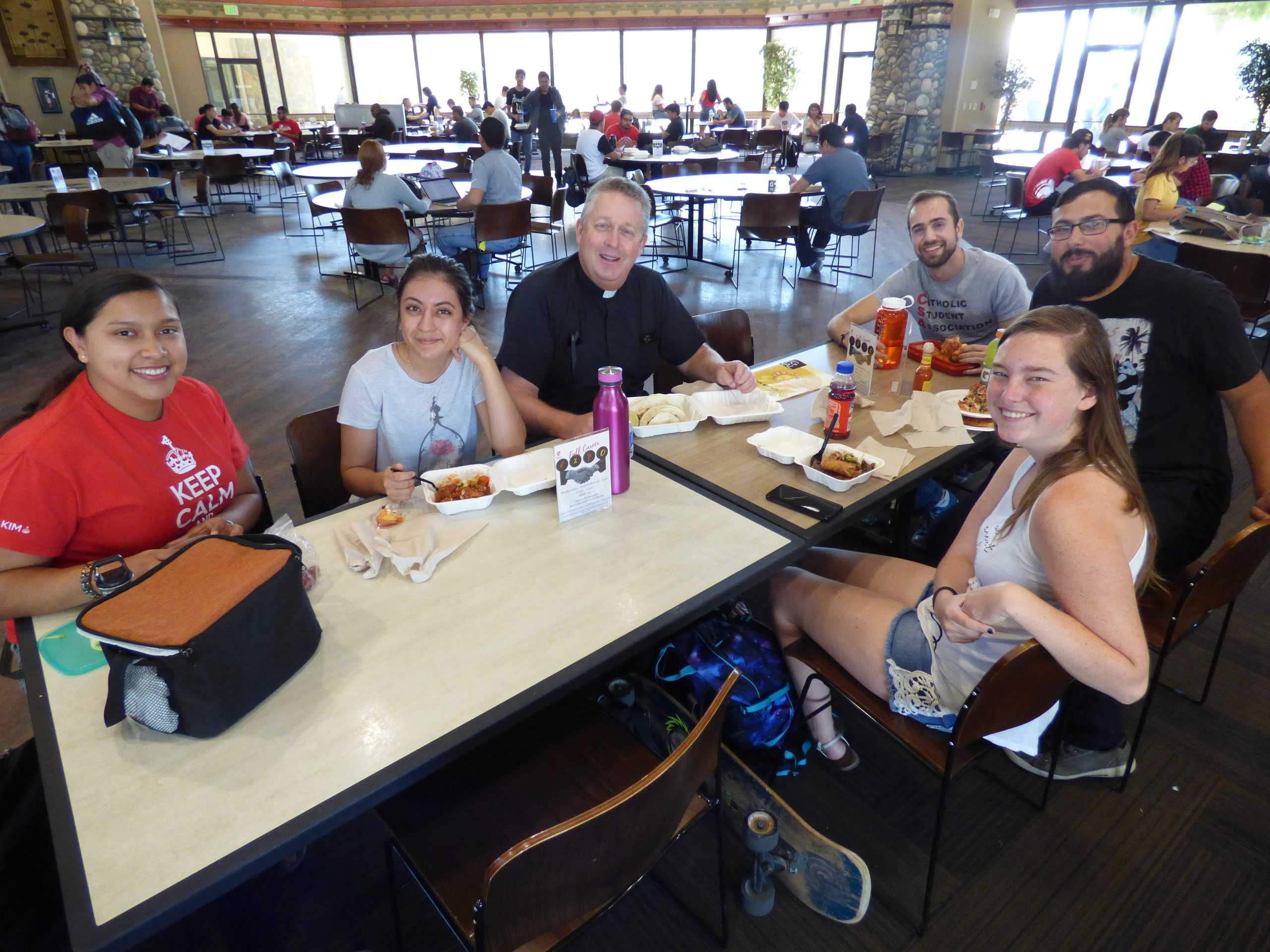 CSA Members Break Bread with Father O'Donnell For The last Time on Campus