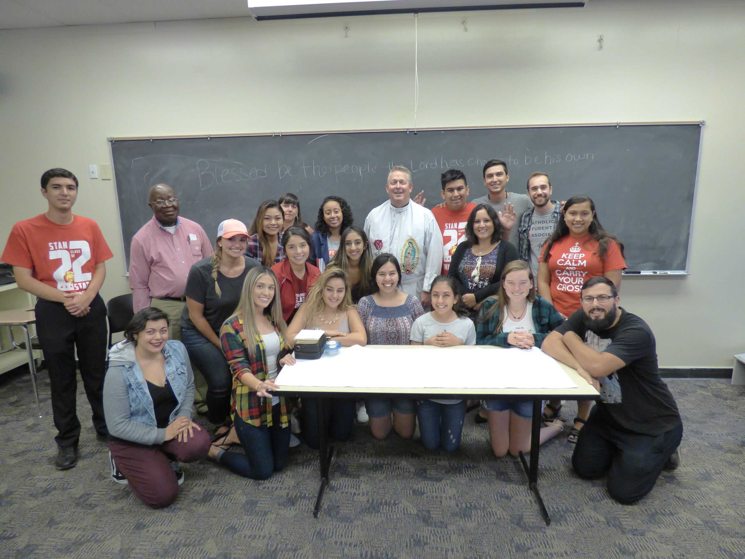 CSA Members Break Bread with Father O'Donnell For The last Time on Campus