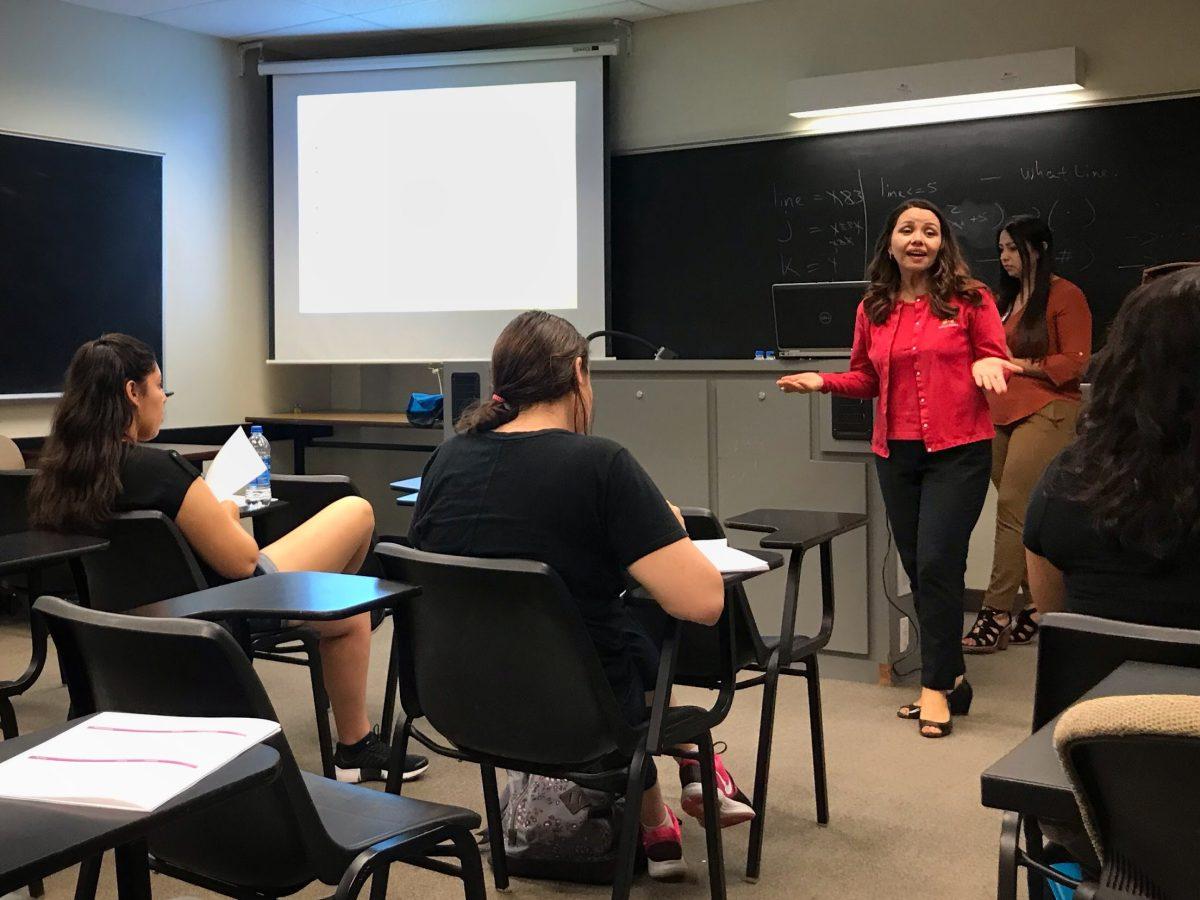 Maricela Abdishou (Branch Manager from Wells Fargo) teaching students on how to manage there student debt. The workshop was held by CSU Stanislaus Financial Aid &amp; Scholarships Department.