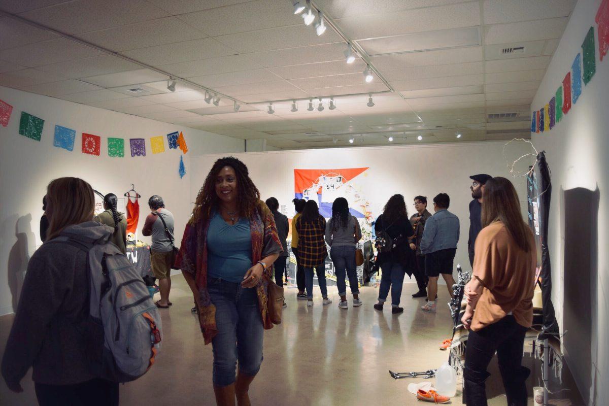 <p>Stan State students and people of the community attend the fourth annual Day of the Dead celebration at the Stan State Art Space. (Signal photo/ Steven Gaxiola)</p>