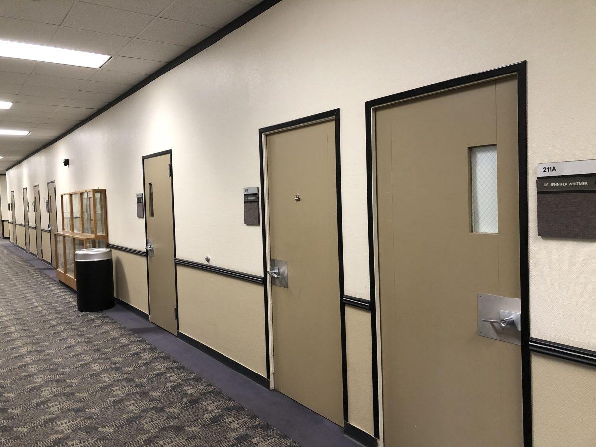 Doors in Bizzini Hall were found unusually blank after Winter Intersession. (Photo Courtesy of Dr. Ann Strahm)