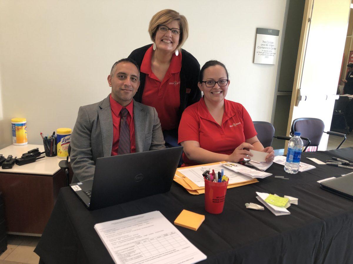 Left to Right: Jaskaran Dhesi, Rebecca Stephens, and Evelyn Ramos, the Career Services Team at their booth at the Career Fair. (Signal&#160;Photo/ Laura Tadeo)&#160;