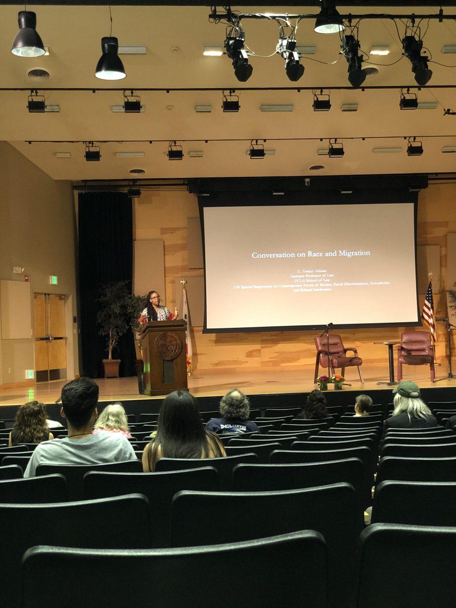 Tendayi Achiume speaks to the audience in Snider Recital Hall. (Signal Photo by Harry Harris)