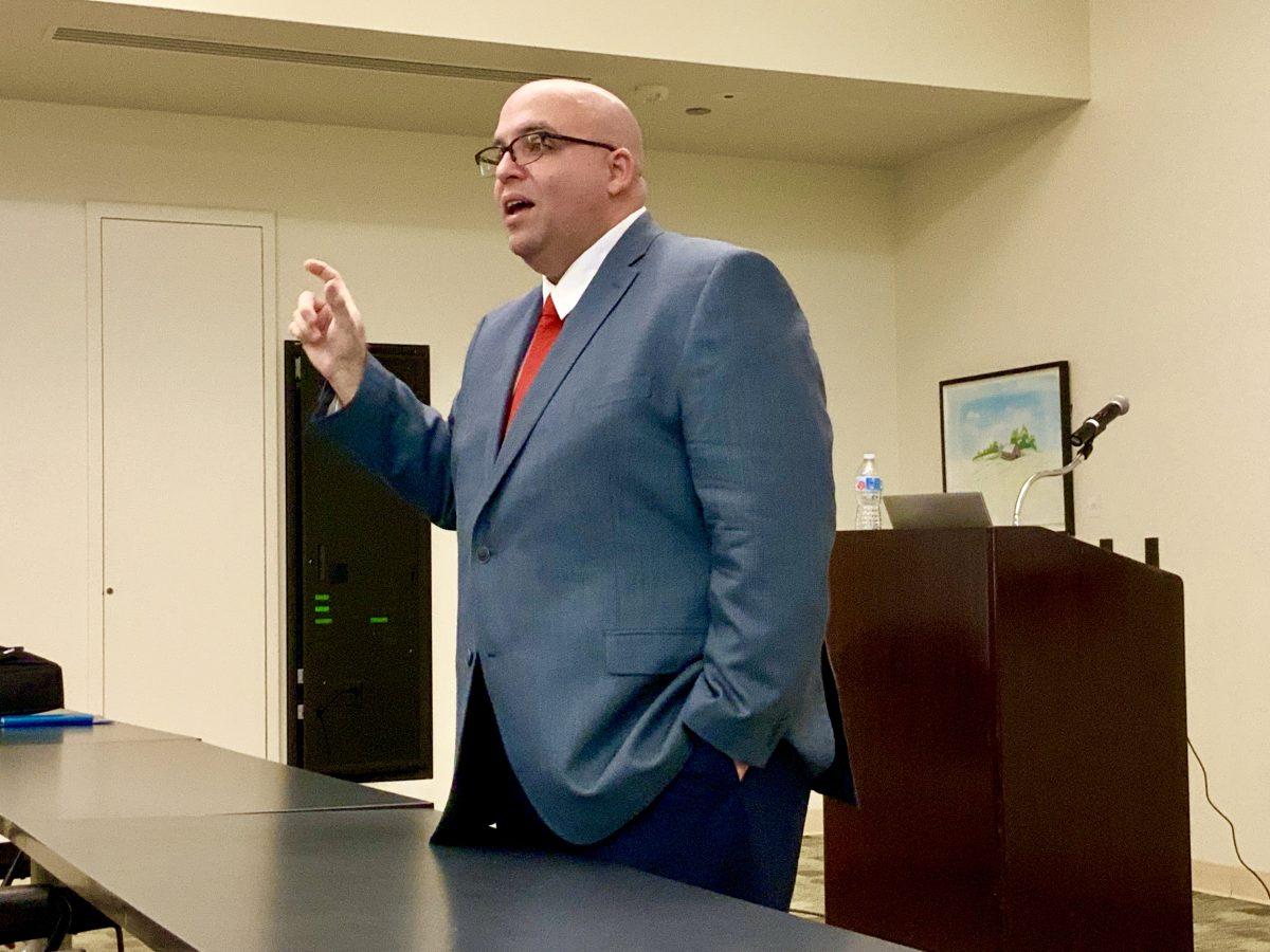 Candidate Dr. Brad Petitfils speaking at MSR 130. (Photo Credit: Randel Montenegro)