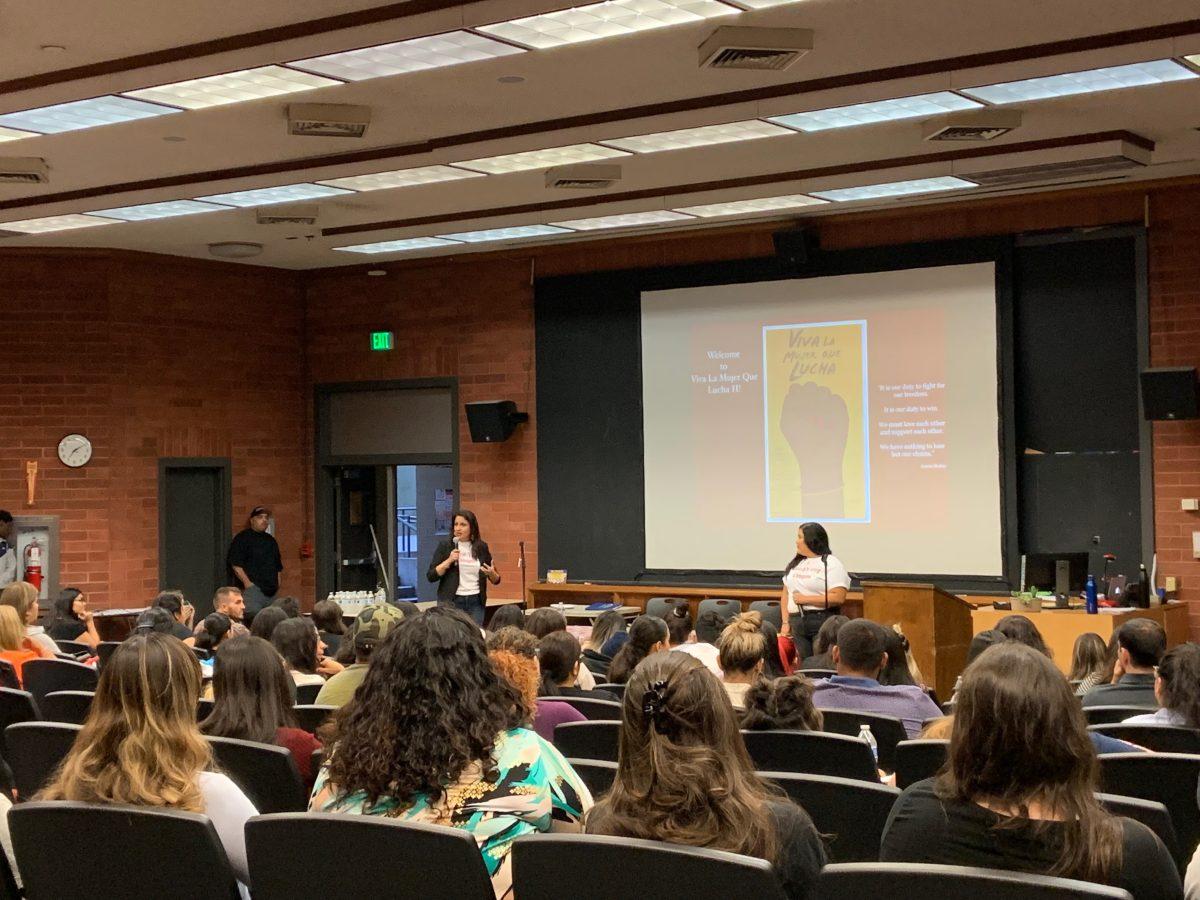 Dr. Melanie Berru (left) and Naomie Gutierrez (right) informing the audience about the event. (Signal Photo/Sandra Plascencia-Rodriguez).