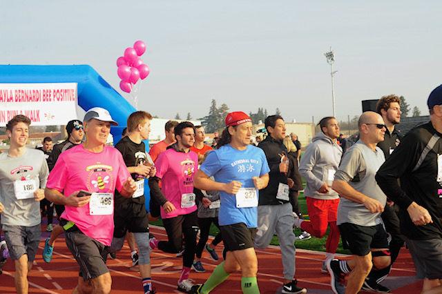 Participants running at the Bee Positive run in January. (Courtesy Photo/Cathie Bernardi)&#160;