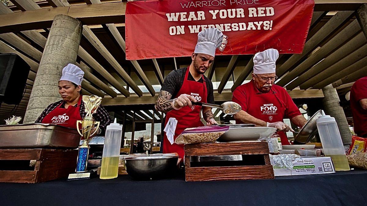 Student, Faculty, and Staff competitors cooking dishes for the judges. (Signal Photo/ Randel Montenegro)