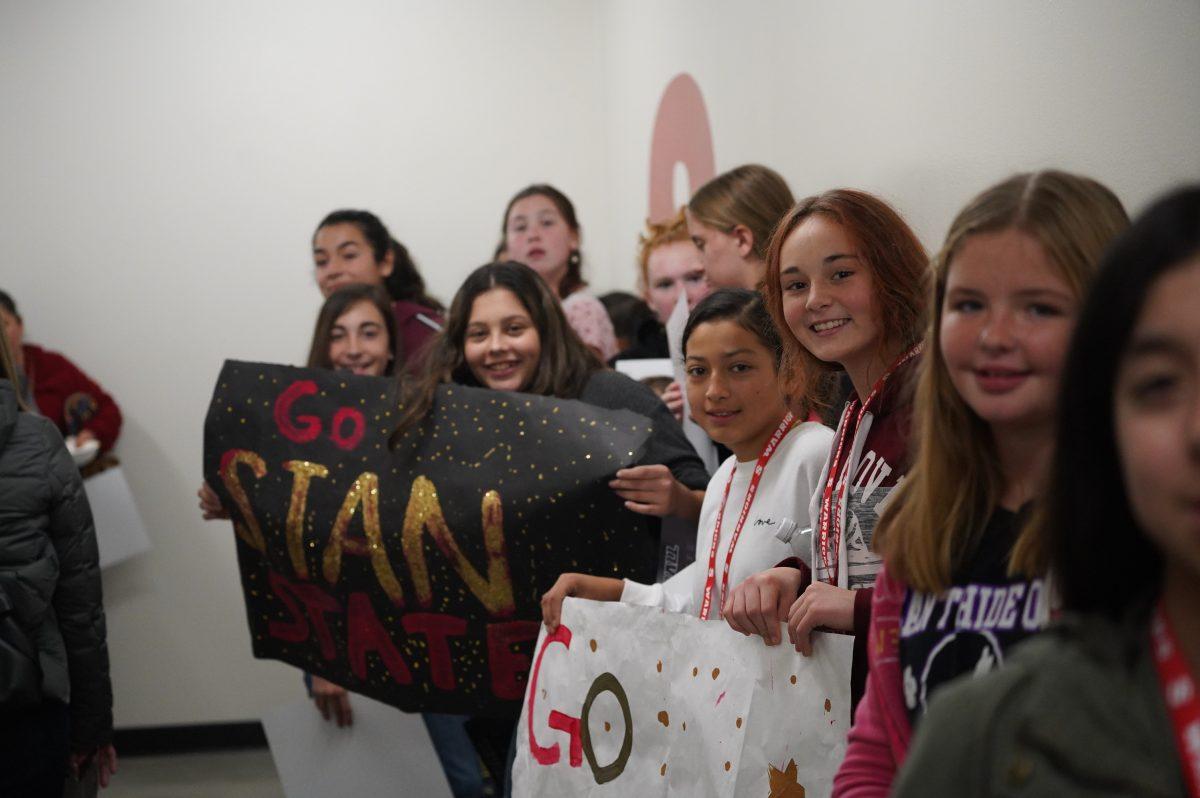 Denair Middle School women's basketball team visiting and greeting the Stan State women's basketball team. (Signal Photo/ Randel Montenegro)