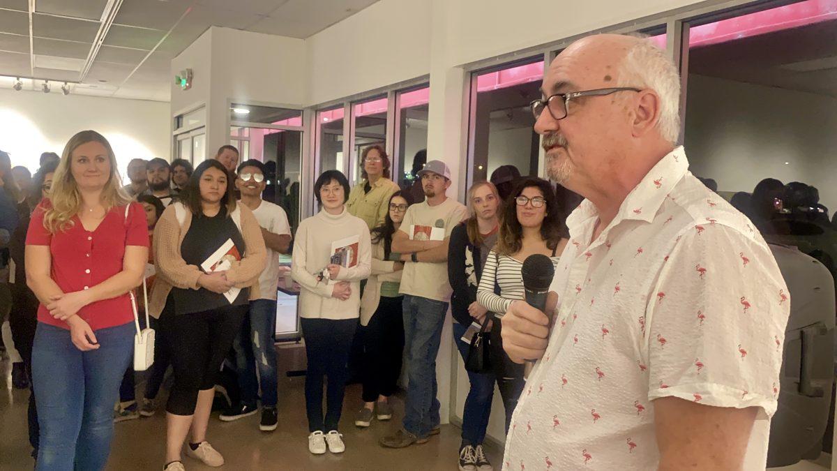 BFA students listening to Deitz's interpretation of his art. (Signal Photo/ Randel Montenegro)