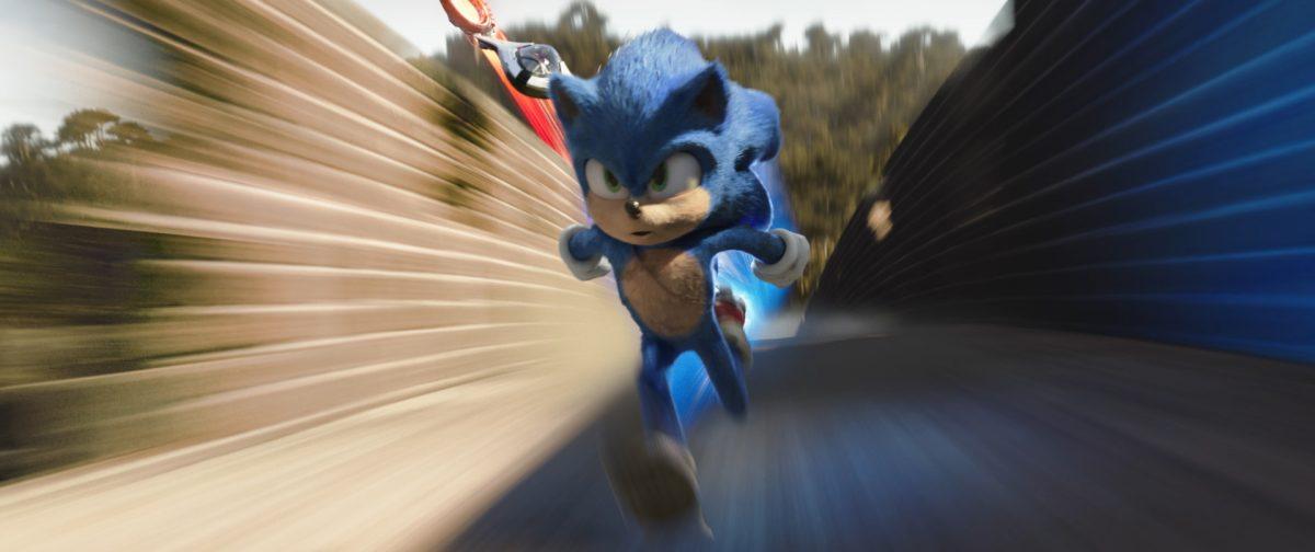 <p>Sonic (Ben Schwartz) running from Dr. Robotnik's robotic machine. (Photo courtesy of Paramount Pictures and Sega of America)</p>