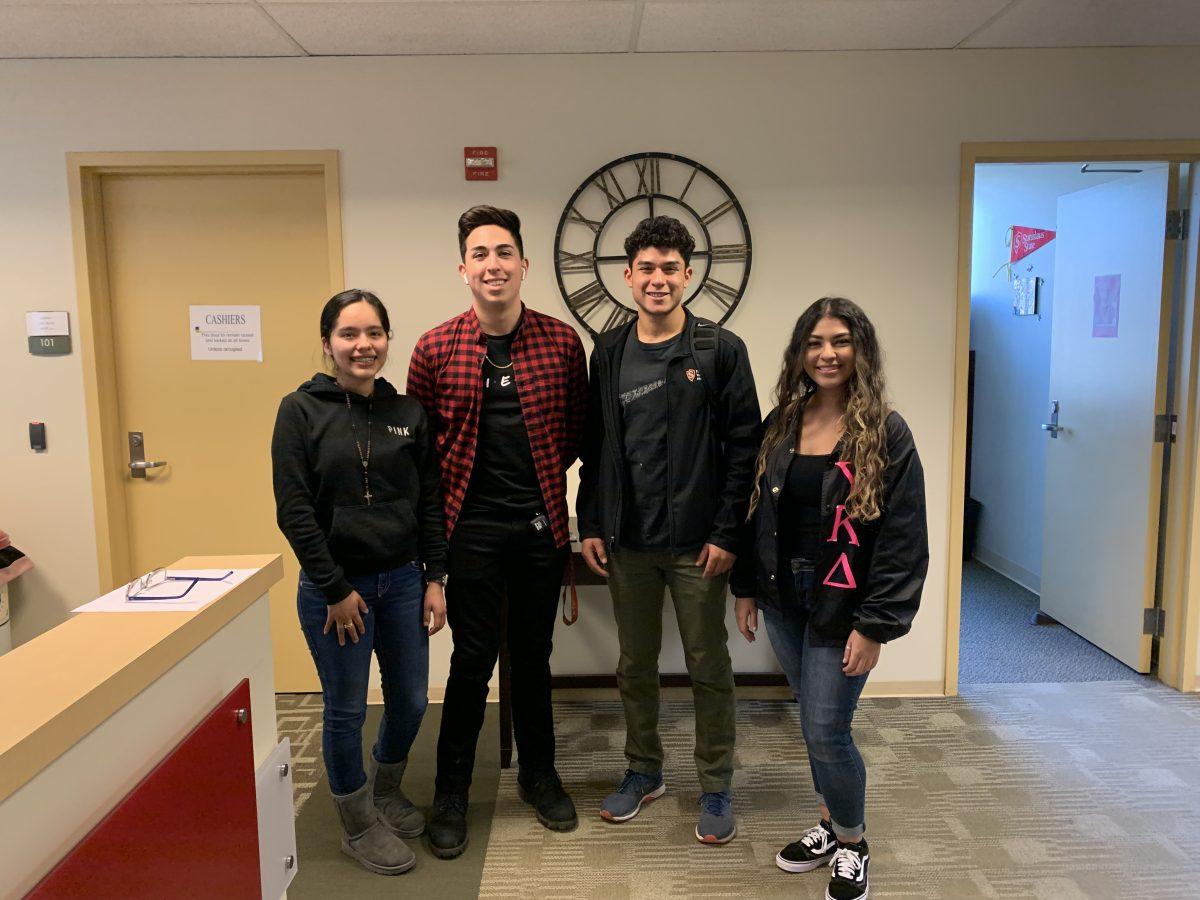 This group of Stan State Students, who work in the Financial Aid Department, talk about their Valentines Day plans. (Left to right) Nayeli Cruz (sophomore, Psychology and Spanish), Gabriel Olide (freshman, Computer Science), Josue Perez (sophomore, Accounting) and Karen Ramos (senior, Psychology). (Signal Photo/Sandra Plascencia-Rodriguez).