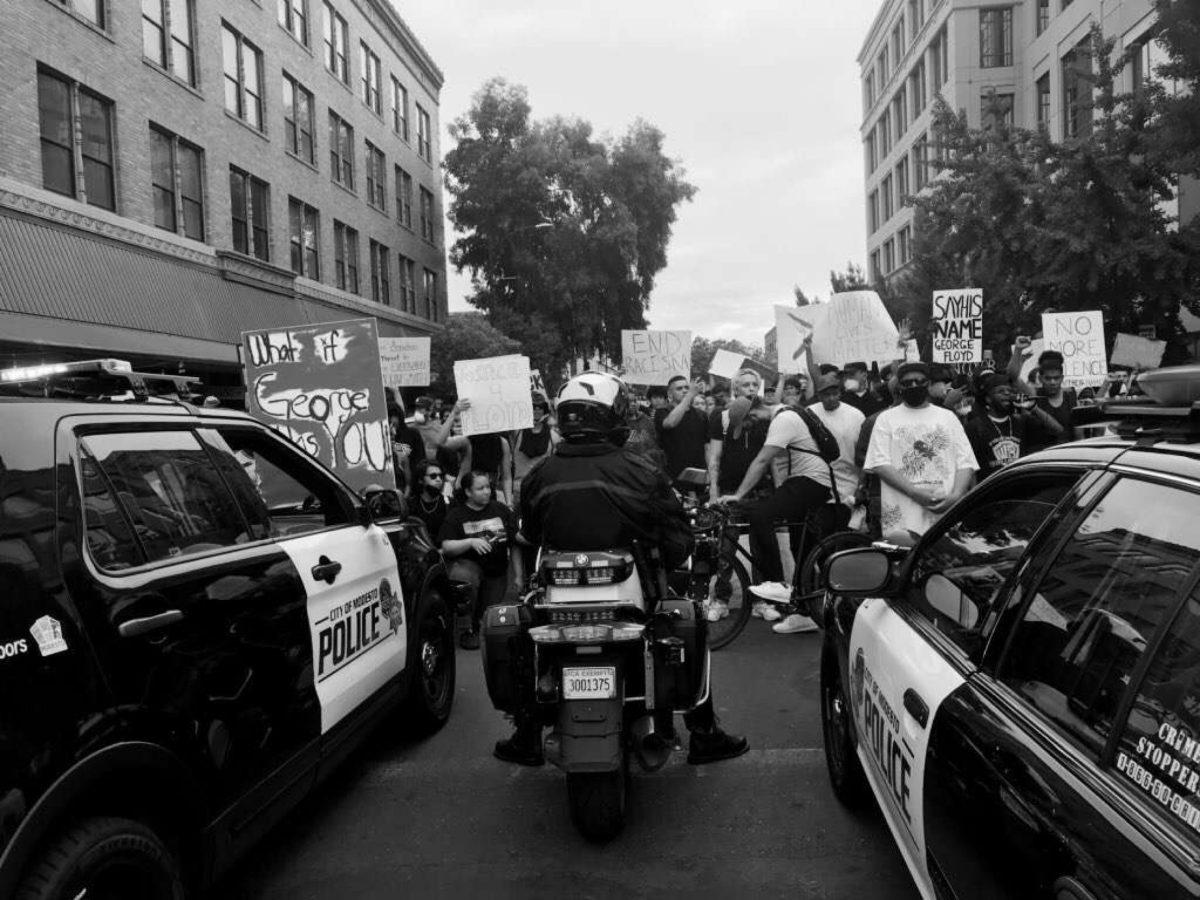 A moment of opposition among protesters and police during the May 31 protest in Modesto, CA. (Image courtesy of community member Gerardo Gonzalez)