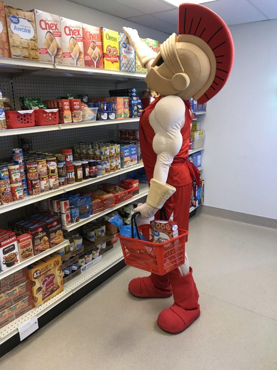 <p>Titus, Stan State's mascot, at the Warrior Food Pantry. (Image courtesy of <a href=