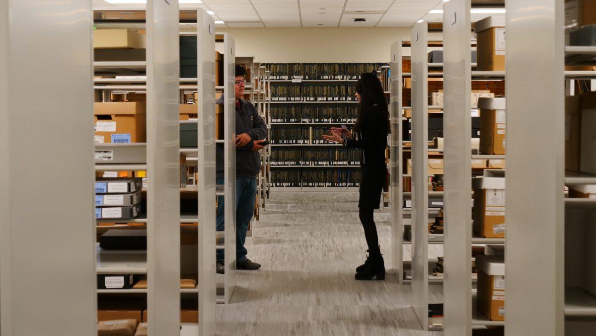 Mary Weppler, Stan States Special Collections & University Archives librarian, speaking with CSU Signal reporter Ushuaya Castillo. The archive room is filled with historic pieces that Stanislaus State seeks to preserve. 
