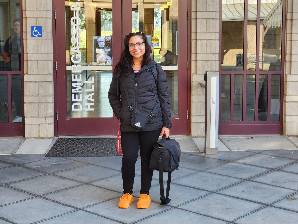 Veronica smiling outside of Demergasso Hall.&#160;