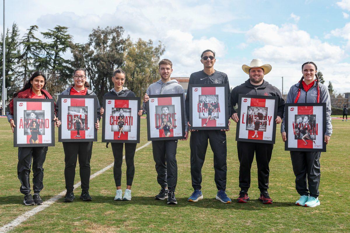 7 commemorated Track & Field Seniors. Pictured left to right: Isabel Arrizano, Caitlyn Bell, Najwa Chouati, Ero Doce, Jose Garcia, Jason Lindsay and Shaylynn Wynn. (Photo Courtesy of JKettering Photography)