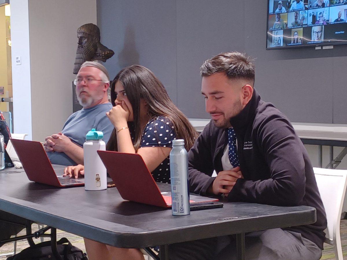 ASI President Adrian Sanchez (right) at todays Academic Senate meeting, who shared his thoughts about the results of last weeks ASI elections. (Signal Photo/Nix Carbone-Deep)