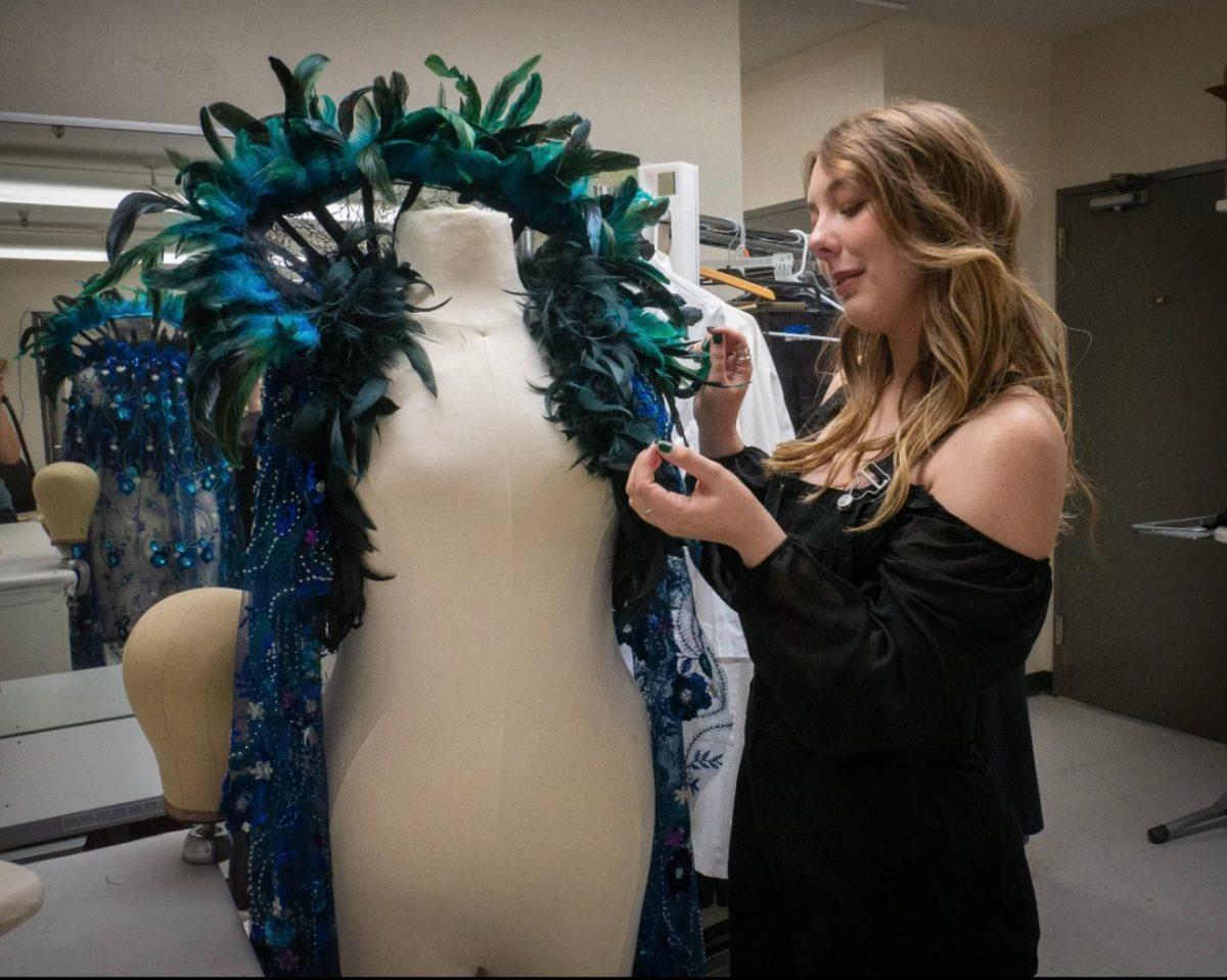 Clara den Dulk designing a costume for the spring 2024 production of Rocky Horror Picture Show at CSU Stanislaus (Photo courtesy of Clara den Dulk)