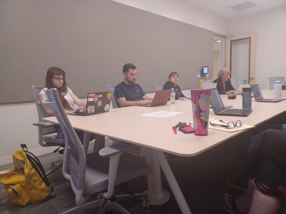 A contingent of Academic Senators meet in Vasche Library room L127 instead of their usual meeting room due to technological issues obstructing communication between virtual and in-person Senators. (Signal Photo/Nix Carbone-Deep)
