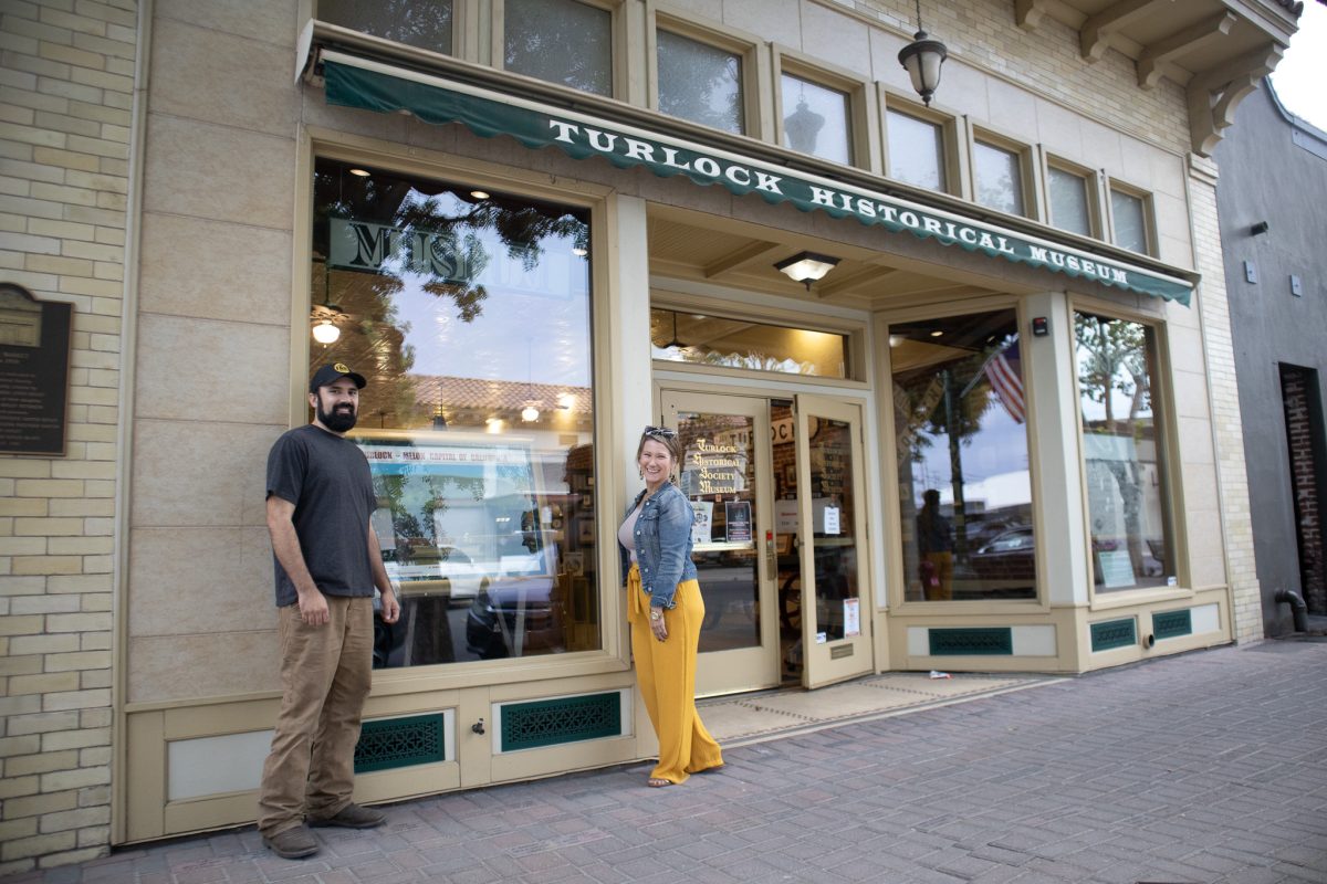 Travis Regalo (left), the Executive Director of the TDPOA, and Amber Traini (right), the woman who ran the Miss Melon Pageant, standing in front of the Turlock Historical Museum together.