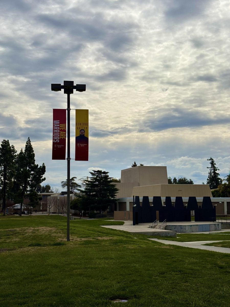 Side view of Stan State's amphitheater and pole banners. 