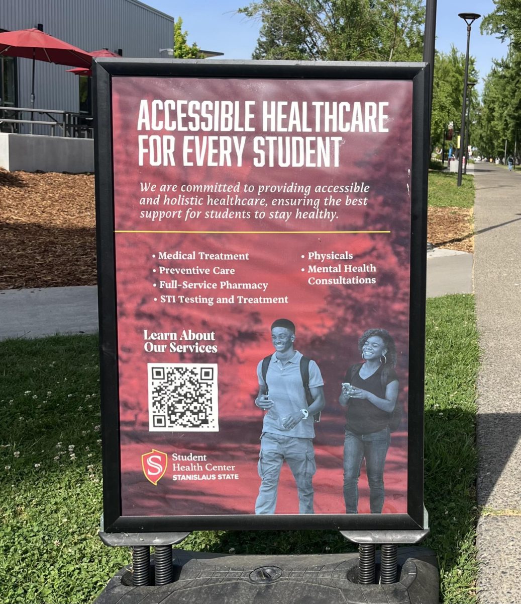 A sign near the Student Health Center advocating for the resources that they offer.