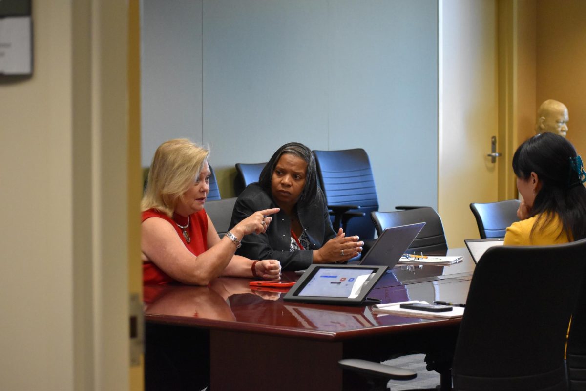 President Rios-Ellis, Rosalee Billingslea Rush and Dai Li having a meeting