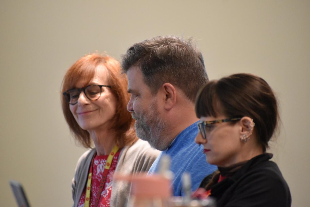 Senator Petrosky and Senator Jampole reminiscing on moments with President Emerita Marlene Hughes.