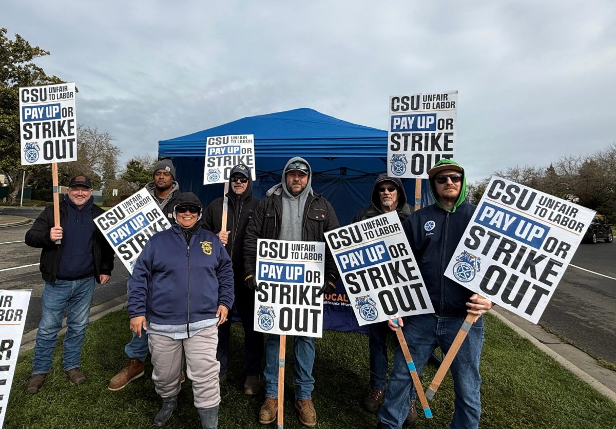 Teamsters Local 2010 at CSU Stanislaus gather at the front entrance of campus to strike on Wednesday, Feb. 18, 2026 in Turlock.
