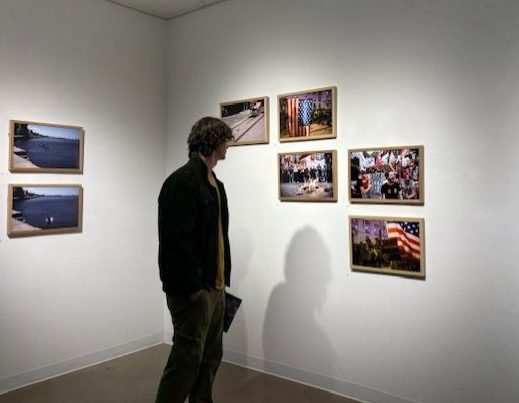 Attendee viewing the photographs displayed by Artur Da Silva at the Stan State Art Space on Thursday, Feb. 5th, 2026, in Turlock.